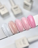 NAILSOFTHEDAY Bottle gel 47 - chłodny róż z drobinką żel do wzmocnienia paznokci, 10 ml